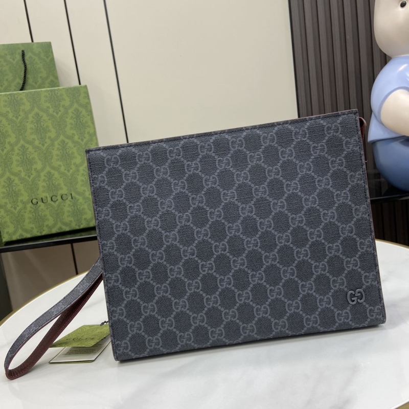 G*u*i clutch bags